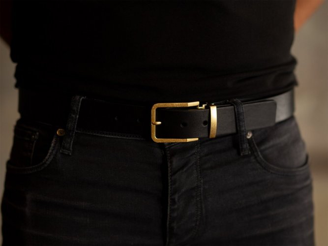 Black leather belt with gold buckle