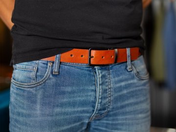 Brown leather belt with black buckle