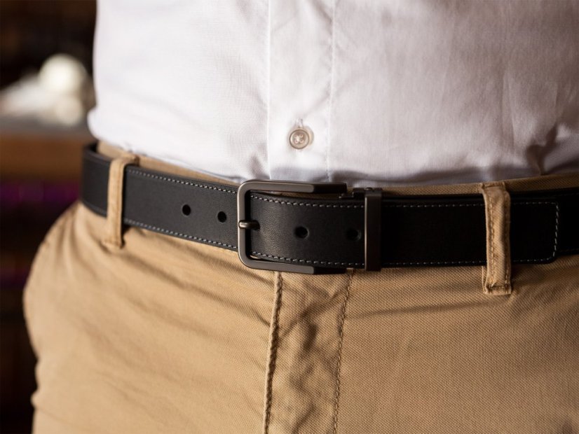 Black leather belt with stitching and black buckle